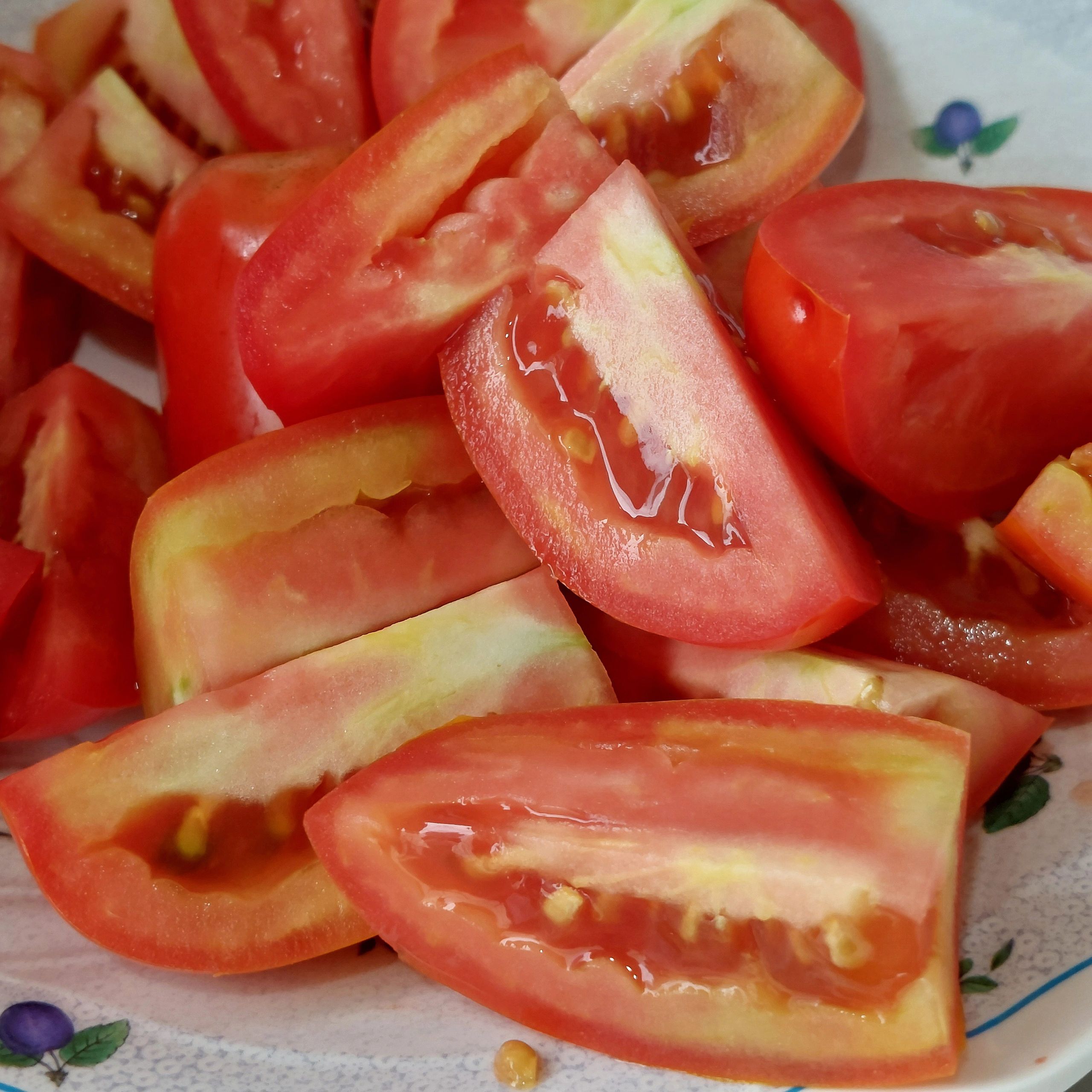 Sliced ripe tomatoes ready for cooking